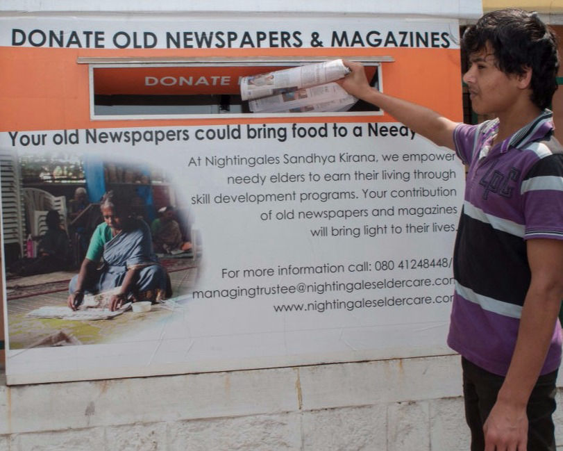 Donating Newspapers at NMT Sandhya Kirana