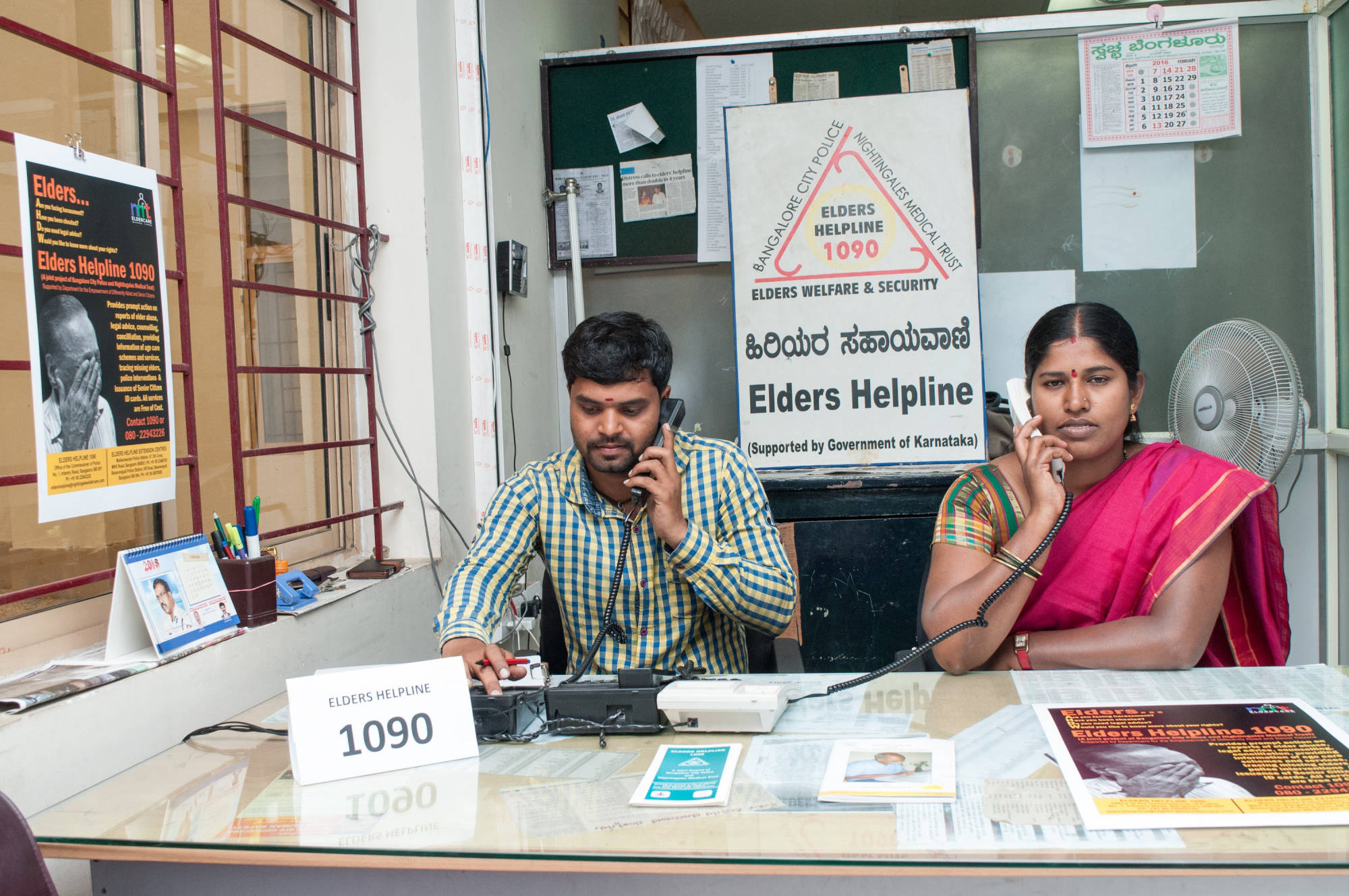 Staff attending calls on the Helpline Number