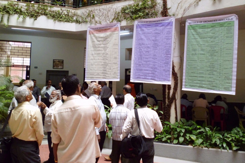 Elders checking for availabe jobs at Job Fair