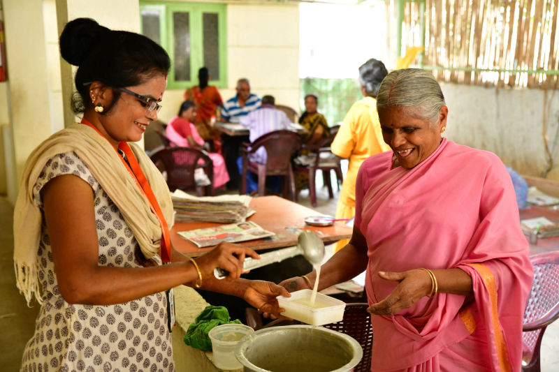 Tasty snacks are provided for elders at SK -K