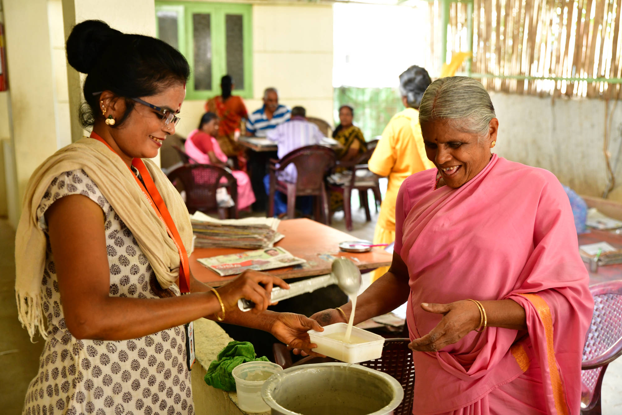 Tasty snacks are provided for elders at SK -K