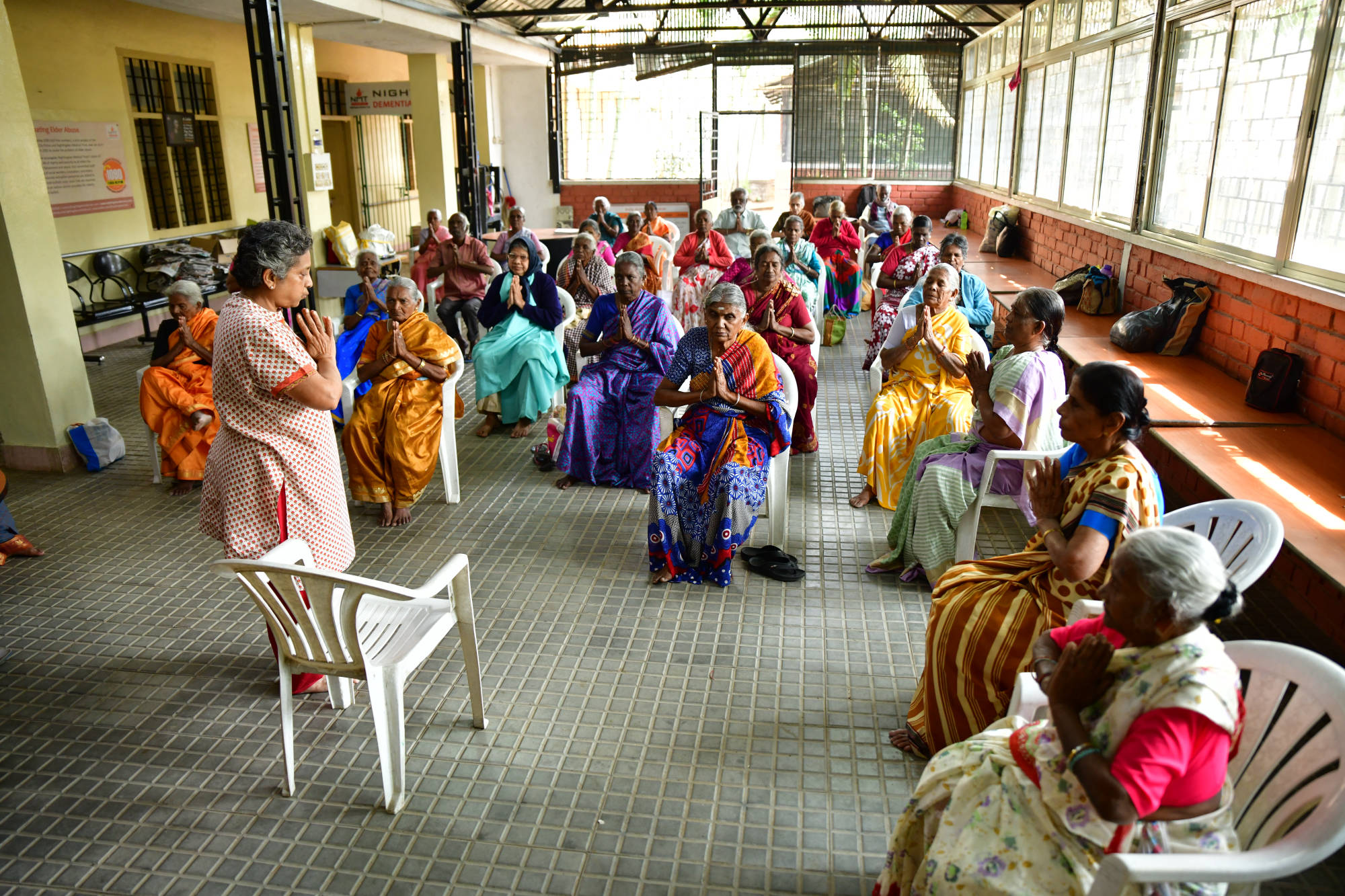 Elders at our centre doing their morning prayer