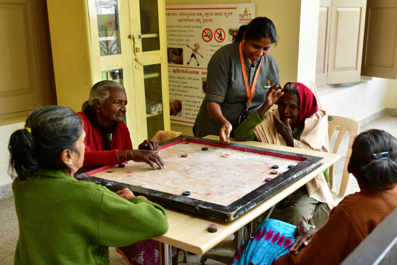 Residents playing Carrom