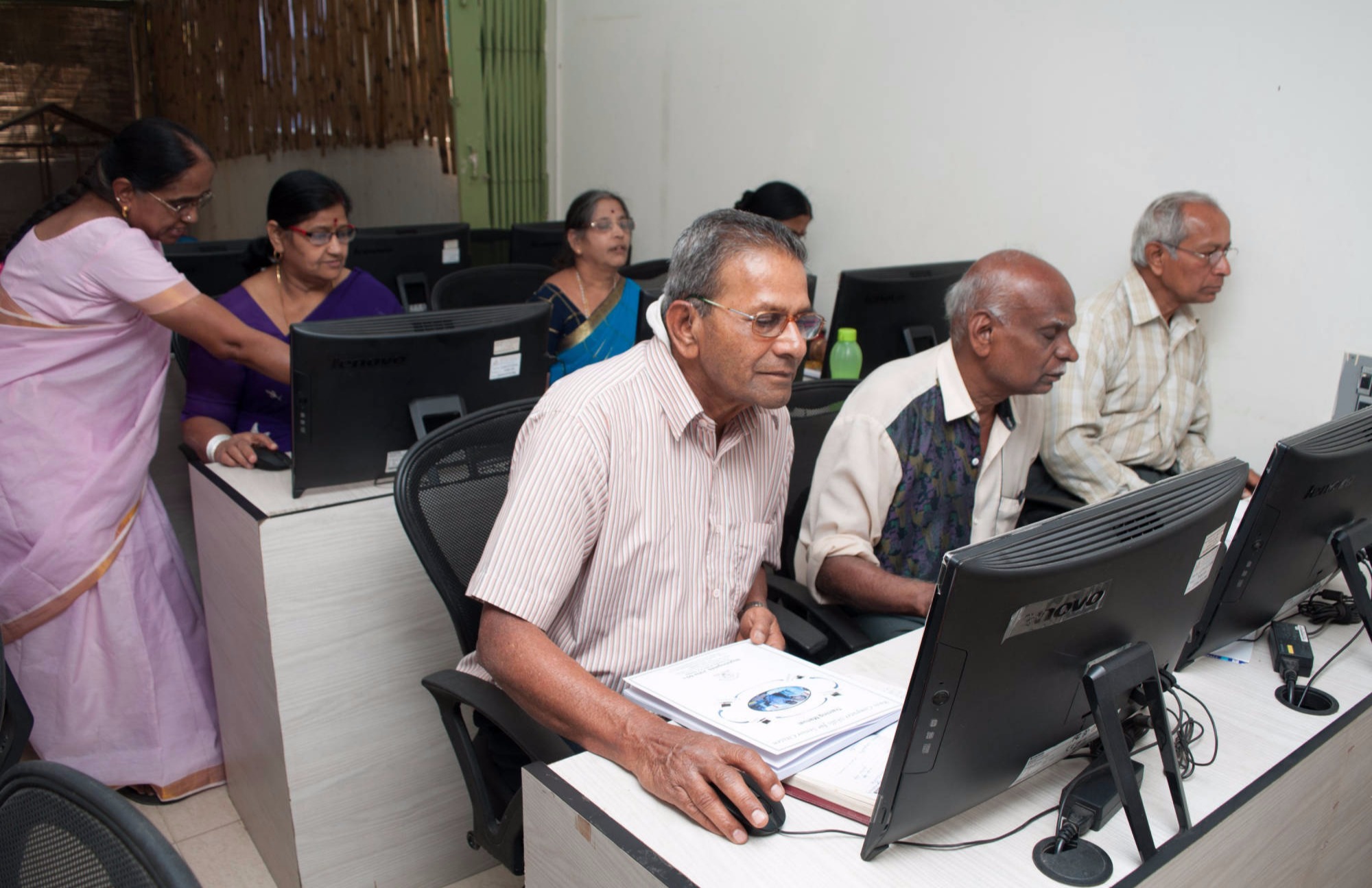 Members from our Jobs 60 centre learning to use Computers